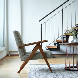 AUKLET designerski, ponadczasowy fotel tapicerowany